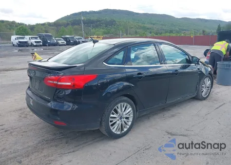 2015 Ford Focus Titanium from USA, damaged, VIN 1FADP3J28FL213712
